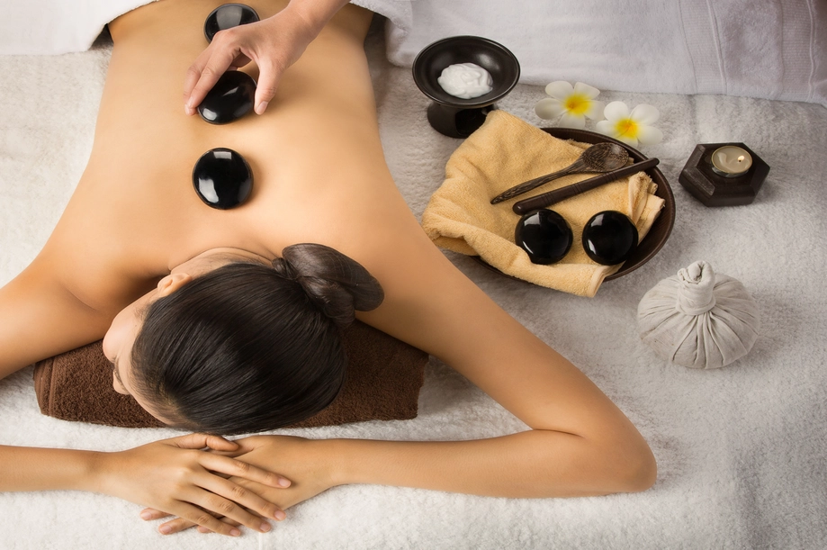 A hot stone massage session at Massage Quest in Edmonton